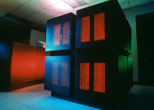 A large rack of densely packed circuit boards forming a Connection Machine unit