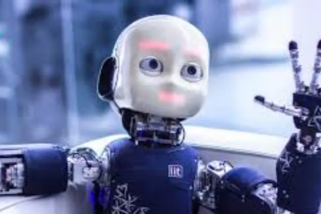 Child-sized white humanoid robot with cameras for eyes, standing upright