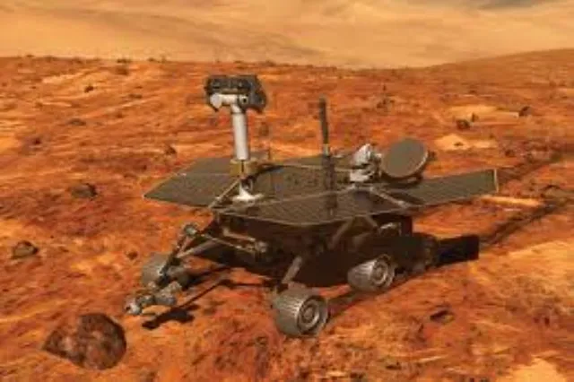 A six-wheeled Mars rover on a rocky reddish surface