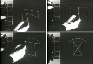 A user drawing geometric shapes on a display screen with a light pen connected to a large computer system
